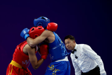 En image les Jeux Asiatiques "Hangzhou 2023" : Wushu - Sanda