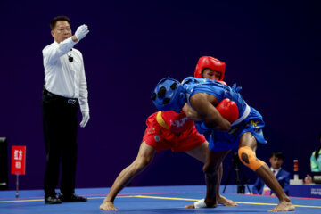 En image les Jeux Asiatiques "Hangzhou 2023" : Wushu - Sanda