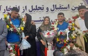کشتی گیران قهرمان خوزستانی با استقبال پرشور مردم وارد فرودگاه اهواز شدند