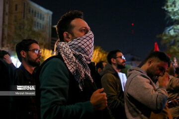 People gather in a square in Tehran to condemn Zionists’ crimes