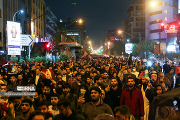 People gather in a square in Tehran to condemn Zionists’ crimes