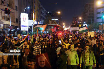 People gather in a square in Tehran to condemn Zionists’ crimes