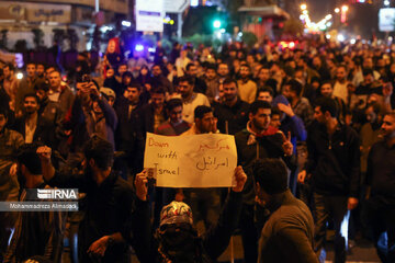 People gather in a square in Tehran to condemn Zionists’ crimes