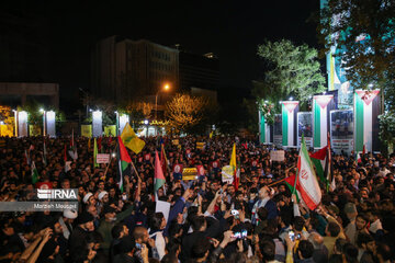 People gather in a square in Tehran to condemn Zionists’ crimes