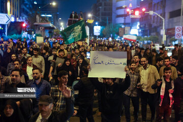 People gather in a square in Tehran to condemn Zionists’ crimes