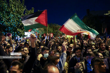 People gather in a square in Tehran to condemn Zionists’ crimes