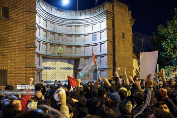 People gather in a square in Tehran to condemn Zionists’ crimes
