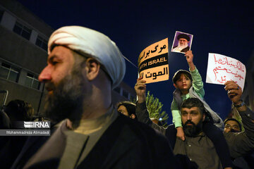 People gather in a square in Tehran to condemn Zionists’ crimes