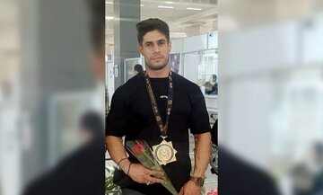 قهرمان پرورش اندام جهان مدال طلایش را به شهید سعید زارع تقدیم کرد