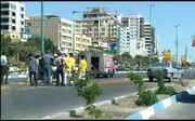 نشت سوخت قاچاق از یک خودرو در بلوار ساحلی بندرعباس +فیلم