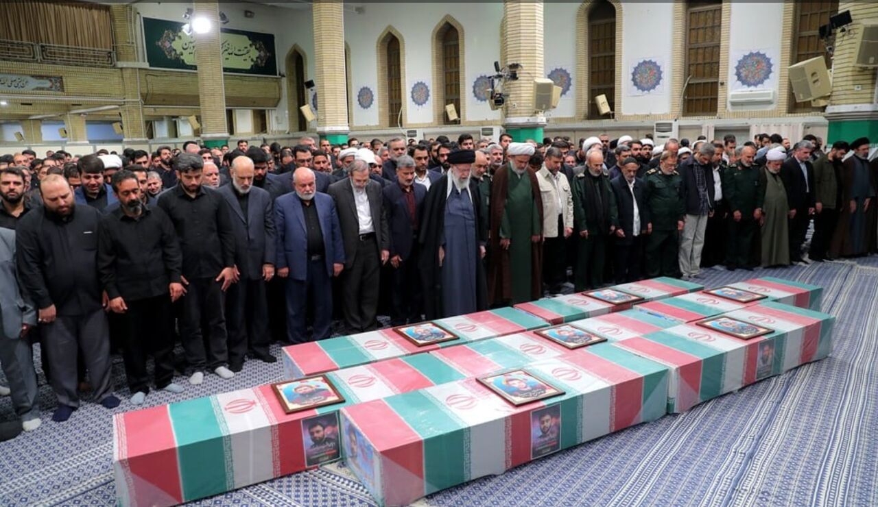 Supreme Leader prays on bodies of Iran's seven martyrs