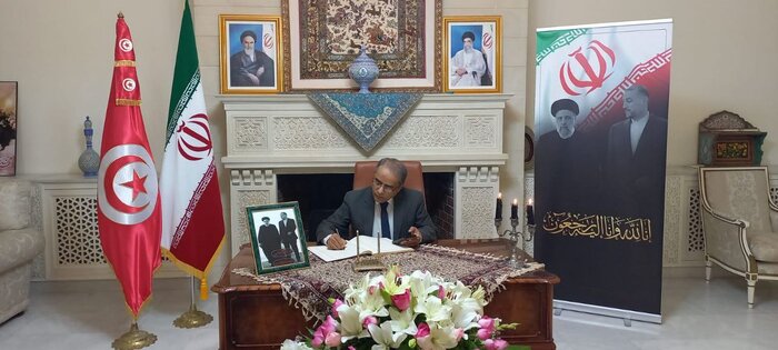 Foreign diplomats in UK, Tunisia sign book opened in memory of President Raisi