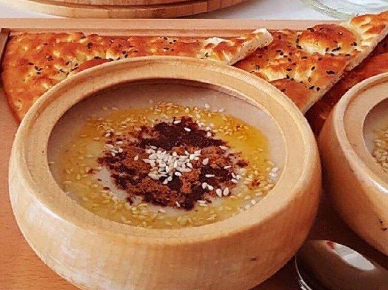 تهیه غلور زابلی (حلیم زاهدانی)؛ غذای نذری محرم و صفر