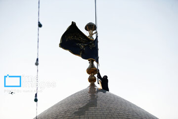 Mourning flag hoisted in Hazrat Masoumeh shrine