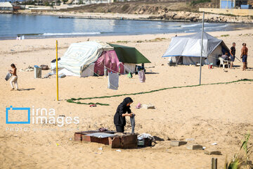 War-hit people of southern Lebanon on coast of Beirut