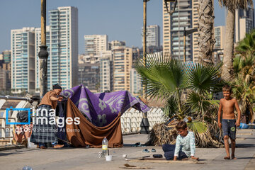 War-hit people of southern Lebanon on coast of Beirut