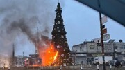 Christmas tree set on fire in Syrian city by masked gunmen