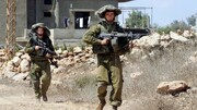 Israel defies withdrawal deadline, keeps some troops in Lebanon