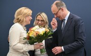 Conservatives win German election as far right sees historic surge in support