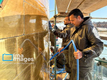 In photos: Imam Reza shrine dome washed ahead of Nowruz