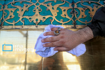 In photos: Imam Reza shrine dome washed ahead of Nowruz
