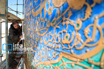 In photos: Imam Reza shrine dome washed ahead of Nowruz