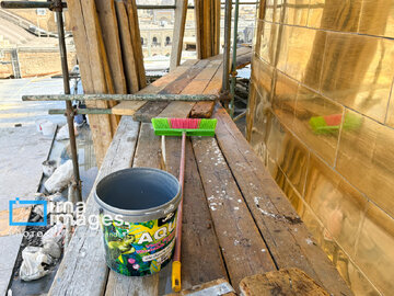 In photos: Imam Reza shrine dome washed ahead of Nowruz