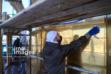 In photos: Imam Reza shrine dome washed ahead of Nowruz