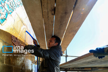 In photos: Imam Reza shrine dome washed ahead of Nowruz
