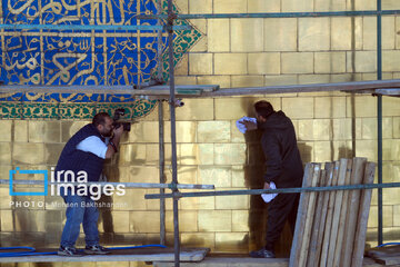 In photos: Imam Reza shrine dome washed ahead of Nowruz