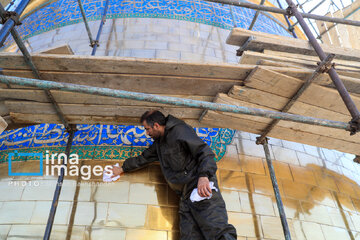 In photos: Imam Reza shrine dome washed ahead of Nowruz