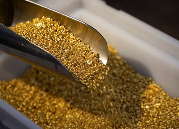 تعدیل تنش تجاری بین چین و آمریکا، قیمت طلا را نزولی کرد