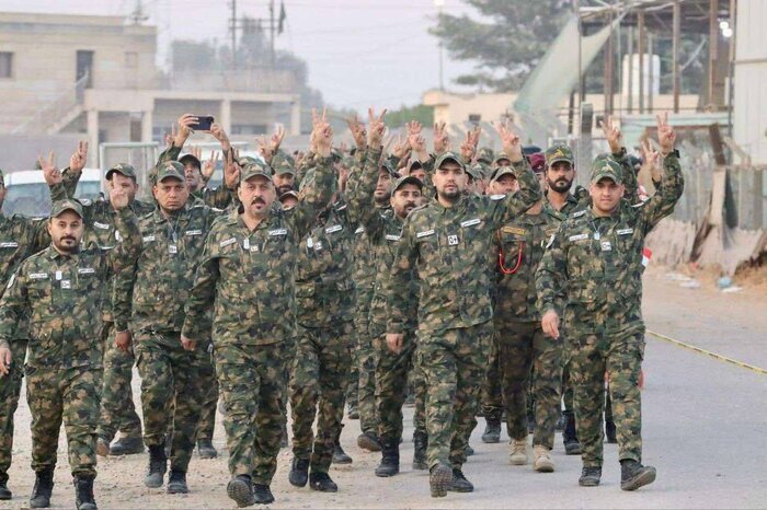 گزارش تصویری ایرنا از مشارکت گسترده نیروهای حشد الشعبی در انتخابات پارلمانی عراق