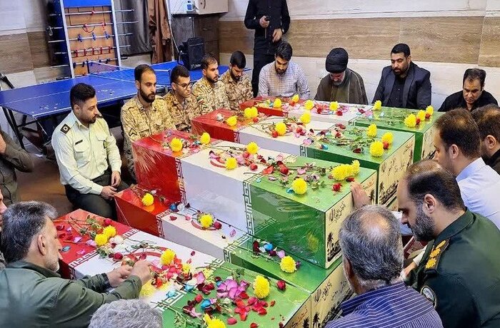 هشت شهید گمنام دفاع مقدس از طریق فرودگاه اهواز وارد خوزستان شدند + فیلم