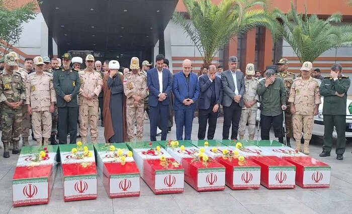 هشت شهید گمنام دفاع مقدس از طریق فرودگاه اهواز وارد خوزستان شدند + فیلم