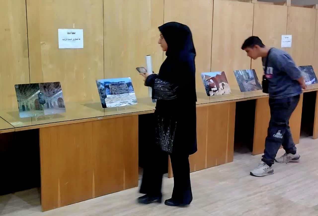 فیلم | نمایشگاه عکس «ایستاده در غبار» در خمین گشایش یافت