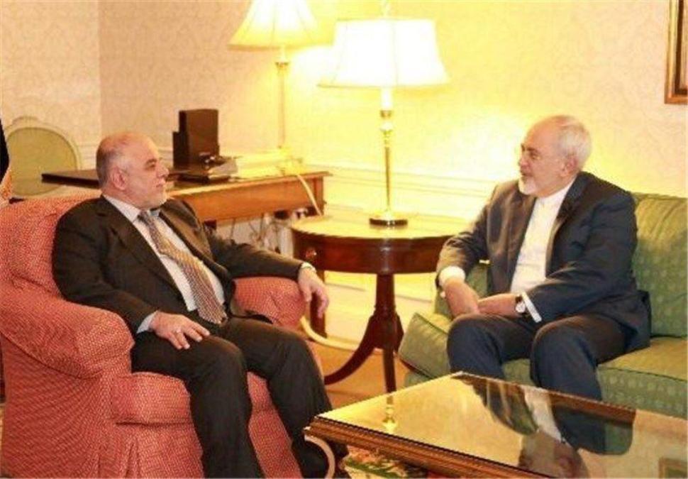 ظريف يلتقي حيدر العبادي ظريف يلتقي حيدر العبادي