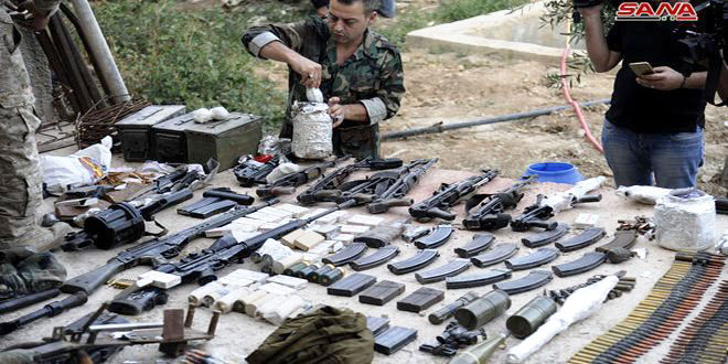 Arms, ammo left behind by terrorists uncovered in Damascus Arms, ammo left behind by terrorists uncovered in Damascus