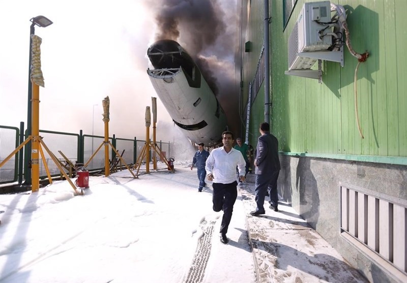 Fire contained in wrecked plane in Tehran airport Fire contained in wrecked plane in Tehran airport