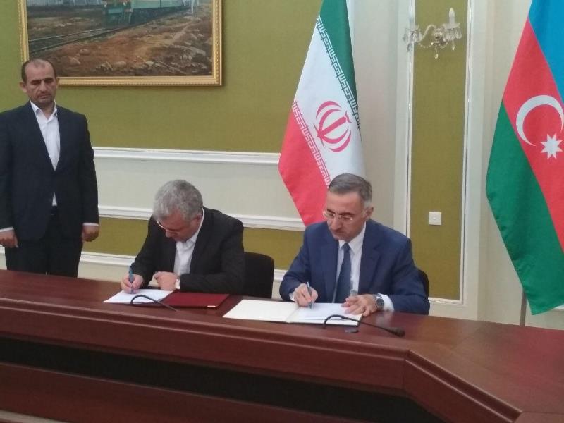 Iran, Azerbaijan sign communications protocol Iran, Azerbaijan sign communications protocol